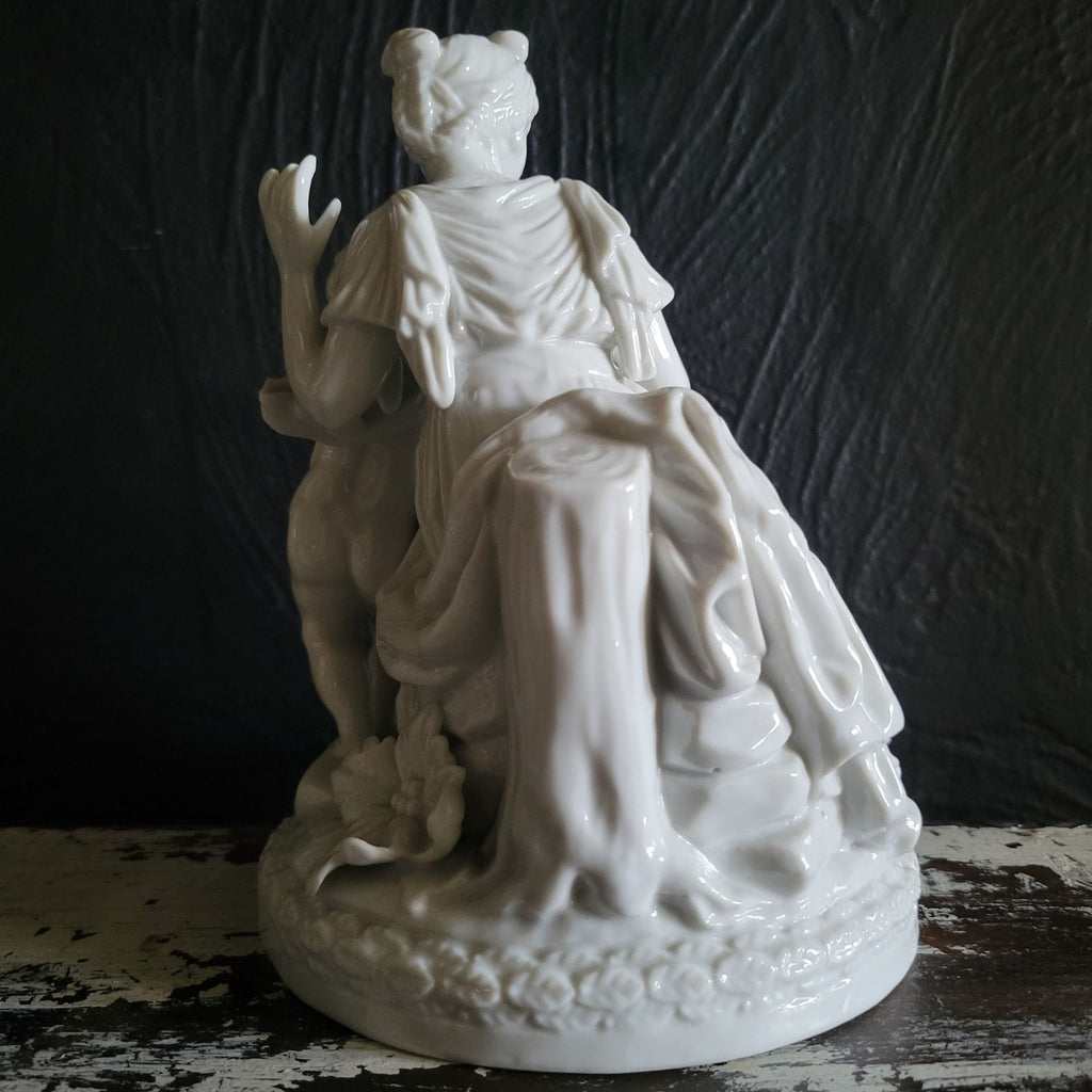 Vintage White Porcelain Figurine Of Woman and Child with Book On Floral Base