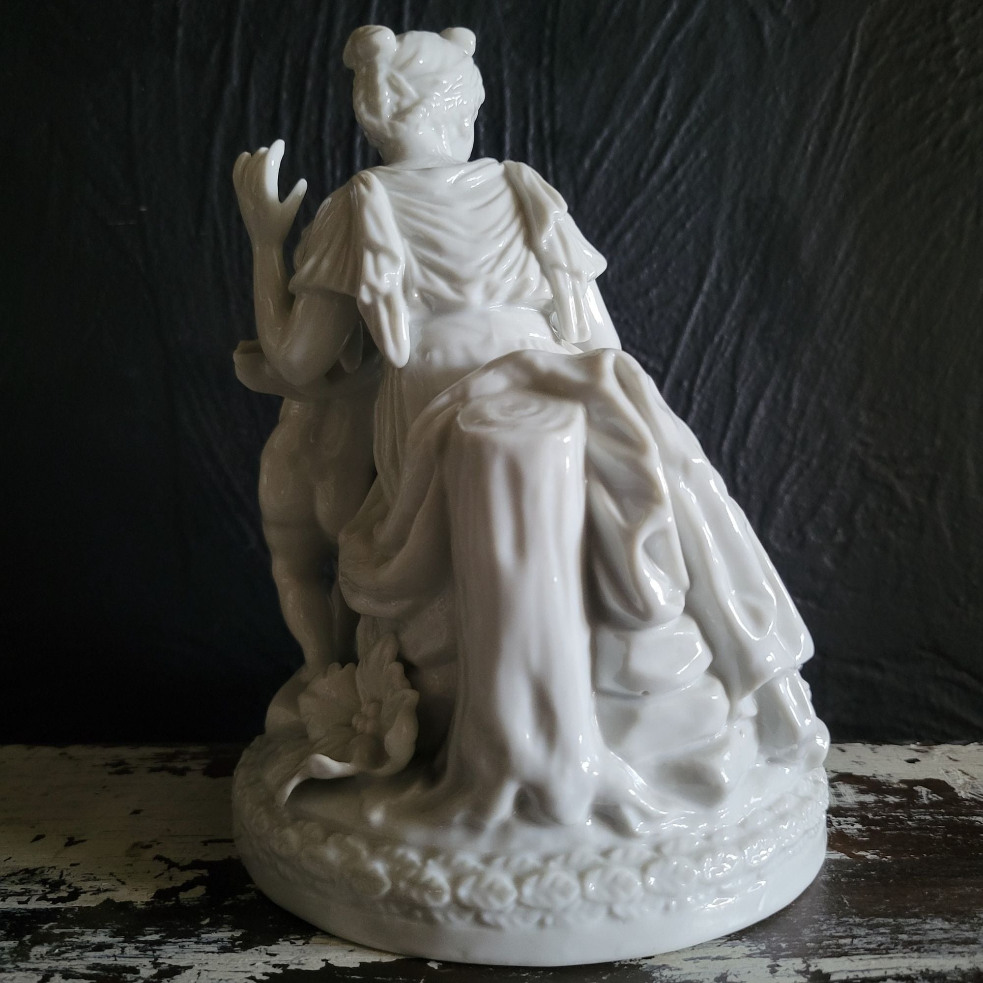Vintage White Porcelain Figurine Of Woman and Child with Book On Floral Base