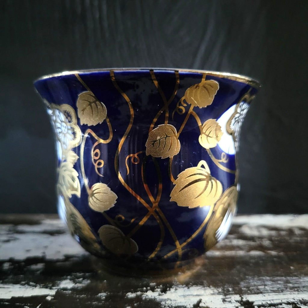 Vintage Cobalt Blue and Gold Porcelain Cup and Saucer with Floral Pattern
