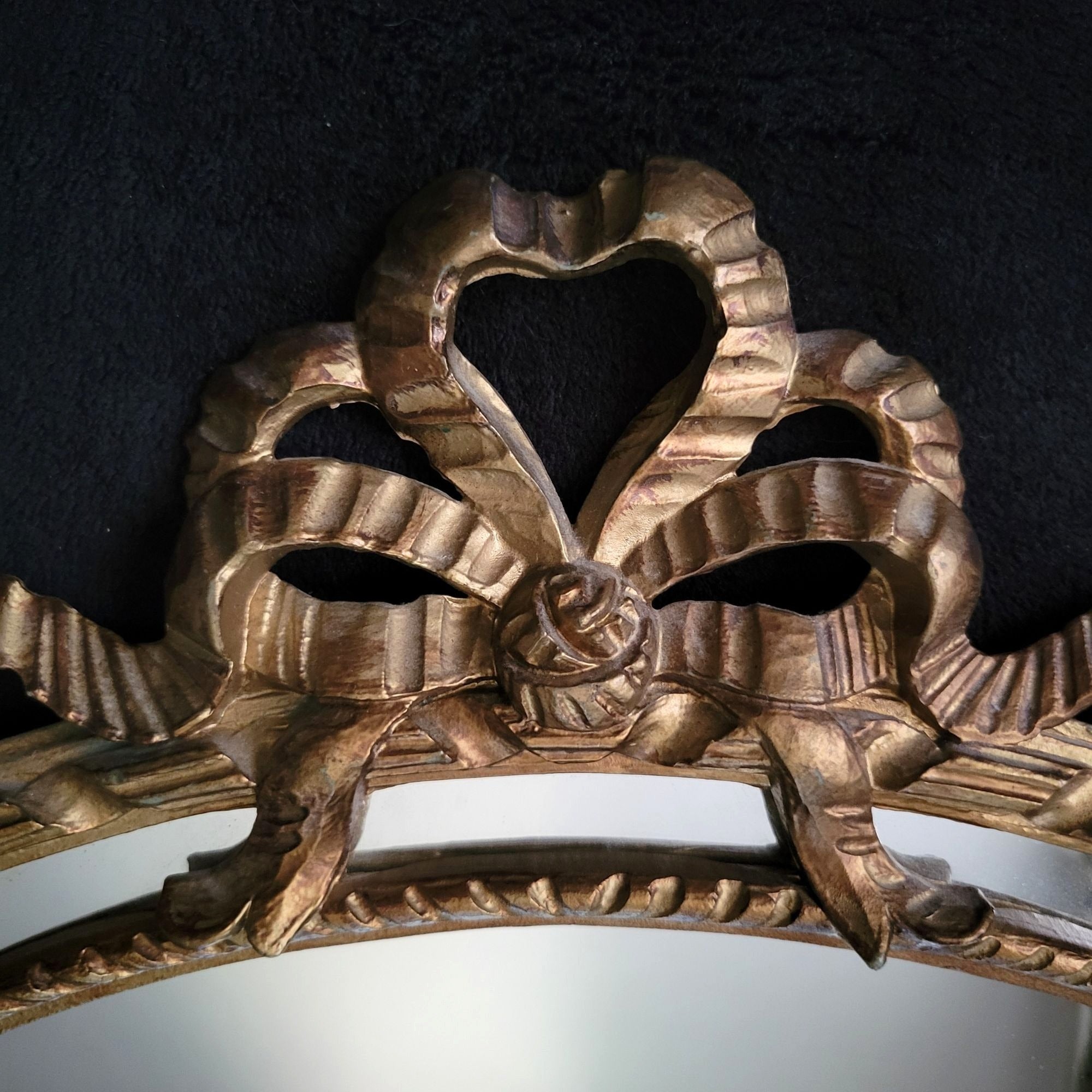 Vintage Italian Gold Oval Wall Mirror With Ornate Floral and Ribbon Design