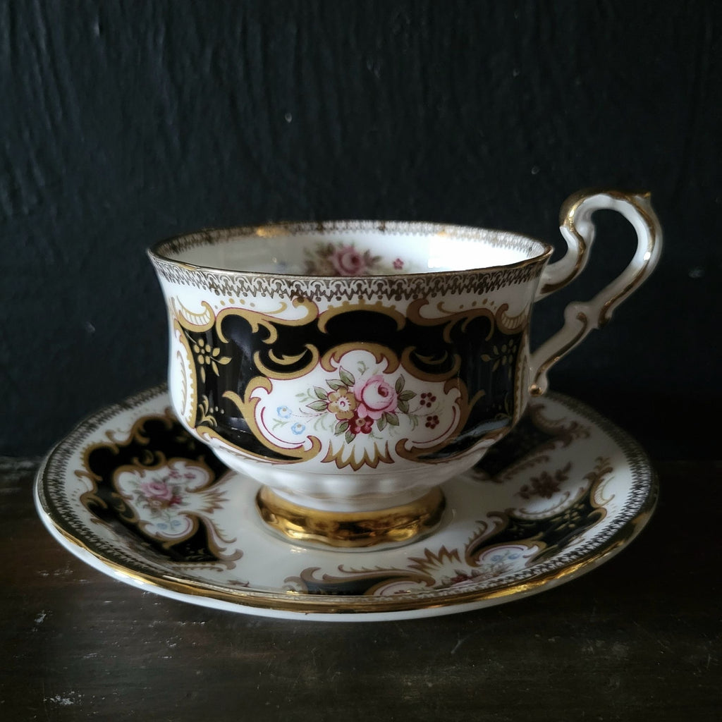 Vtg Paragon By Appointment To Her Majesty Tea Cup & Saucer Black Gold & Floral
