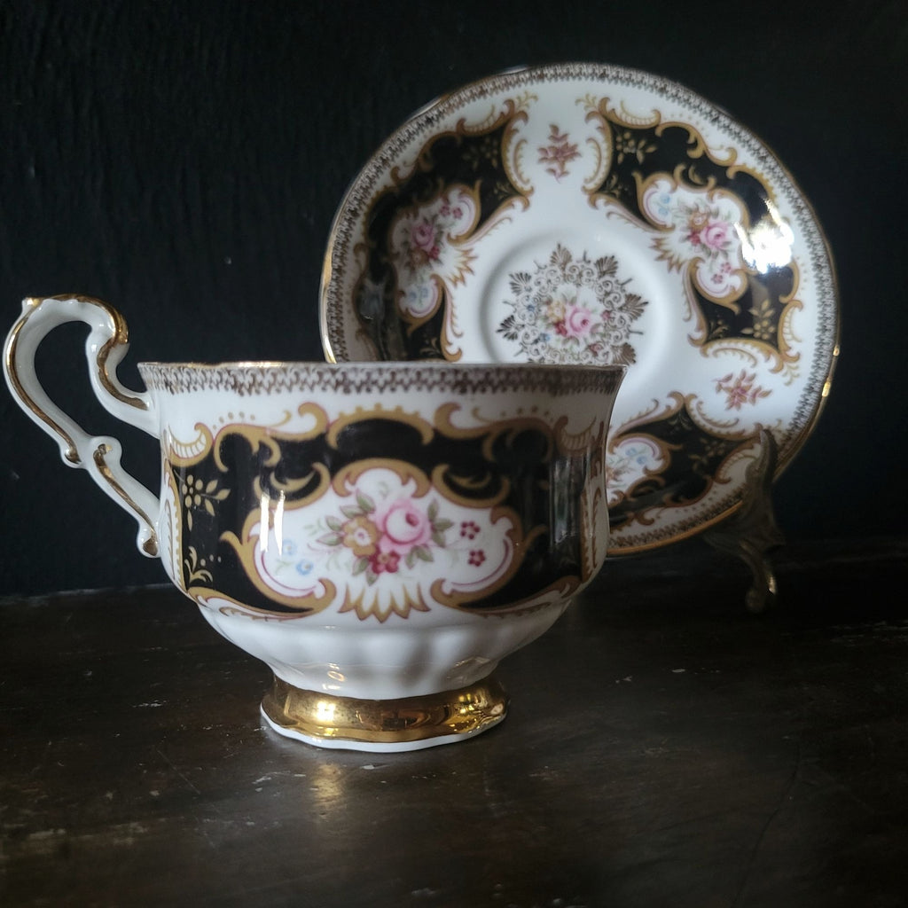 Vtg Paragon By Appointment To Her Majesty Tea Cup & Saucer Black Gold & Floral