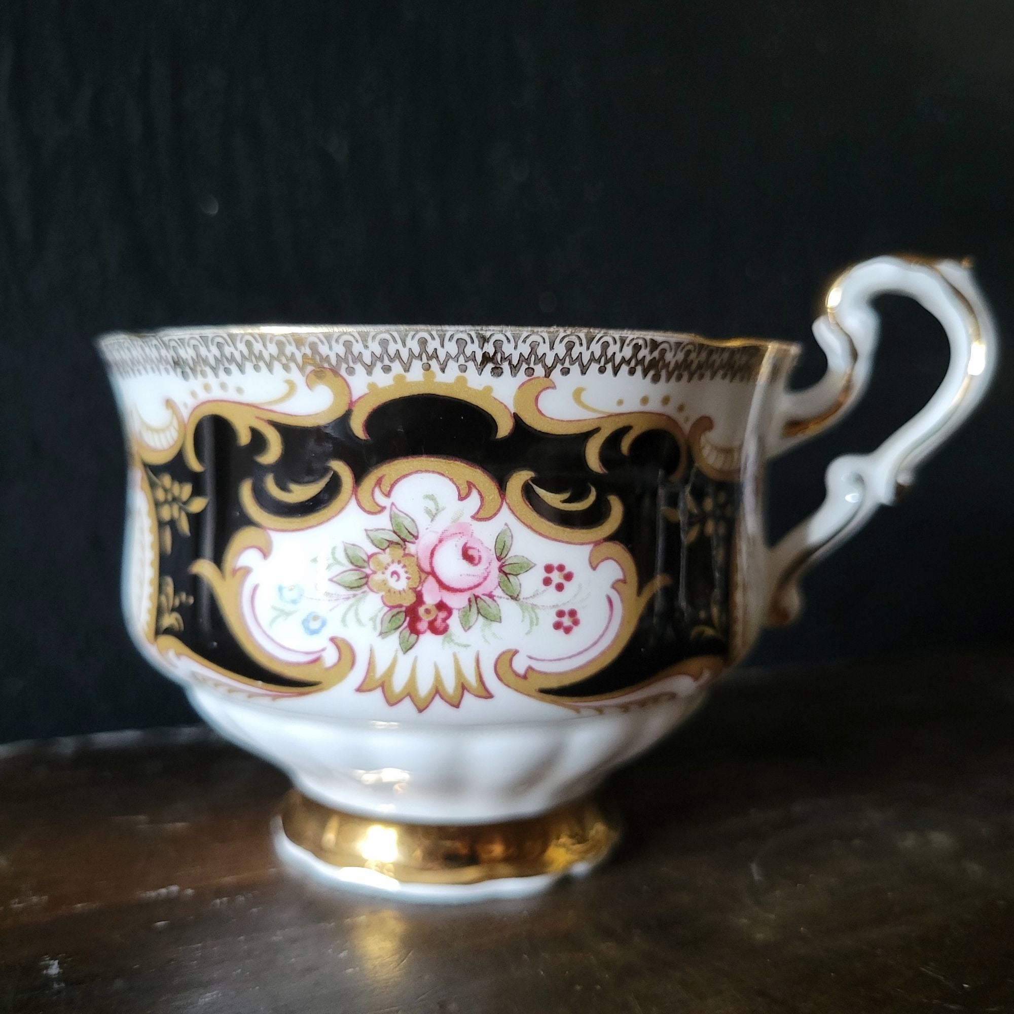 Vtg Paragon By Appointment To Her Majesty Tea Cup & Saucer Black Gold & Floral