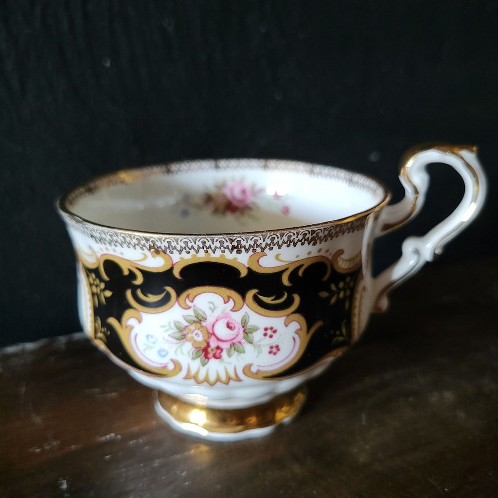 Vtg Paragon By Appointment To Her Majesty Tea Cup & Saucer Black Gold & Floral