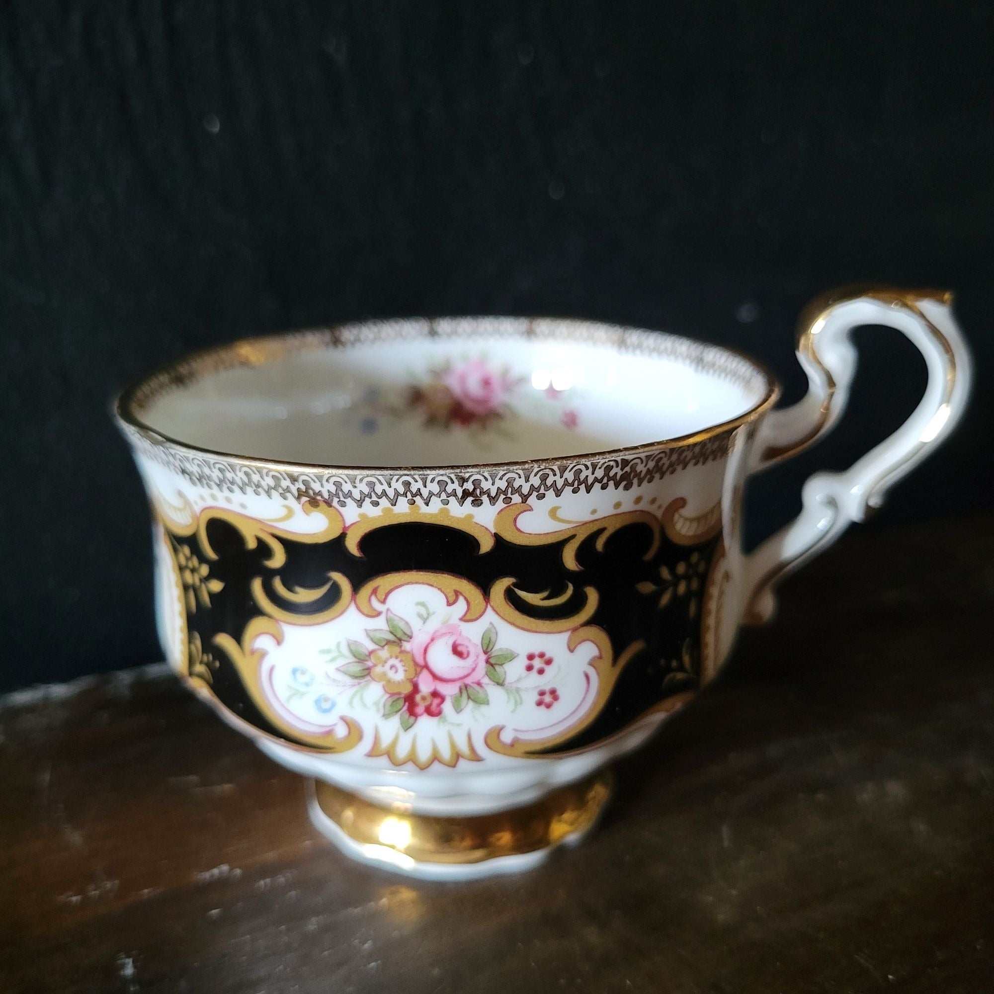 Vtg Paragon By Appointment To Her Majesty Tea Cup & Saucer Black Gold & Floral