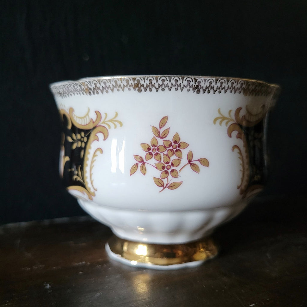 Vtg Paragon By Appointment To Her Majesty Tea Cup & Saucer Black Gold & Floral