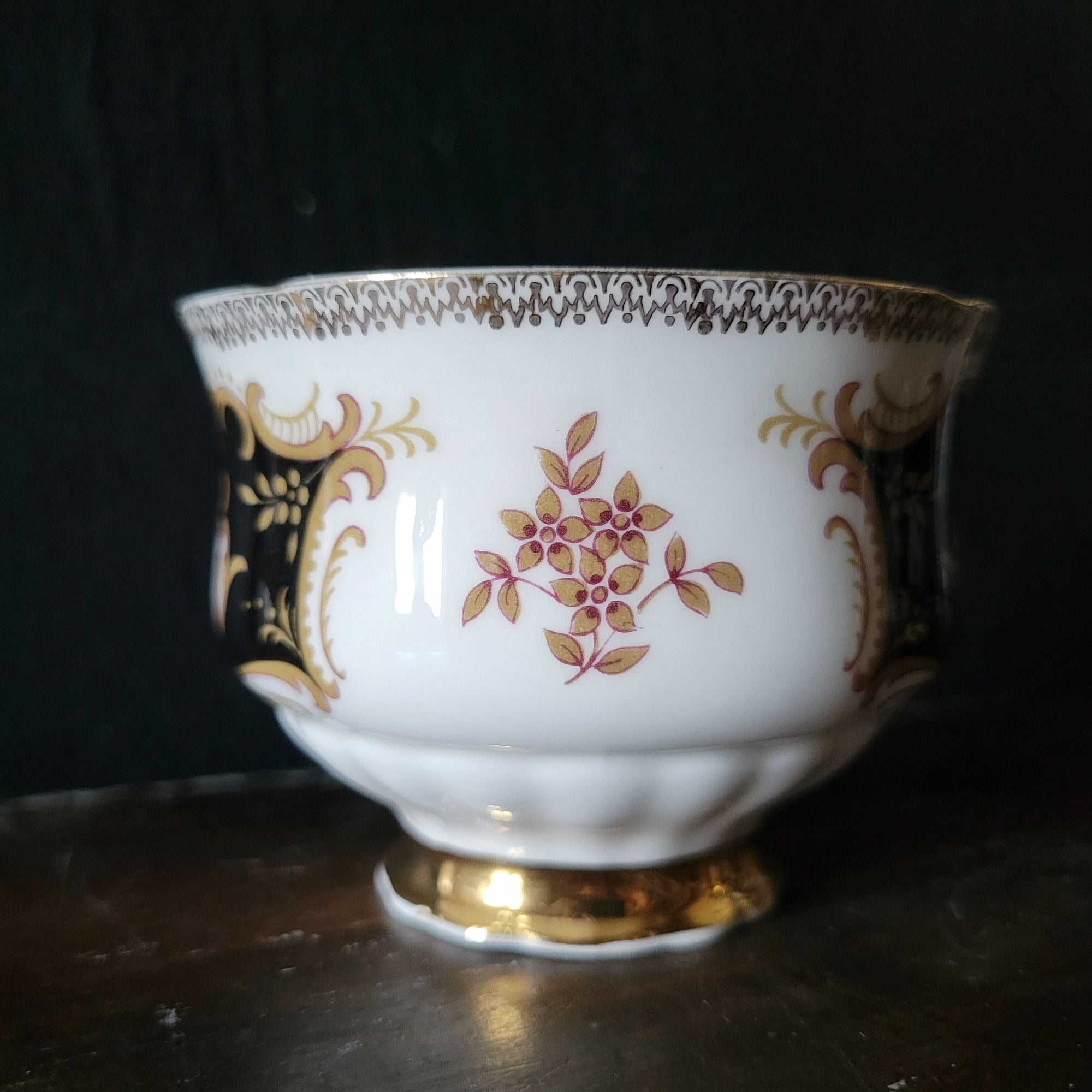 Vtg Paragon By Appointment To Her Majesty Tea Cup & Saucer Black Gold & Floral