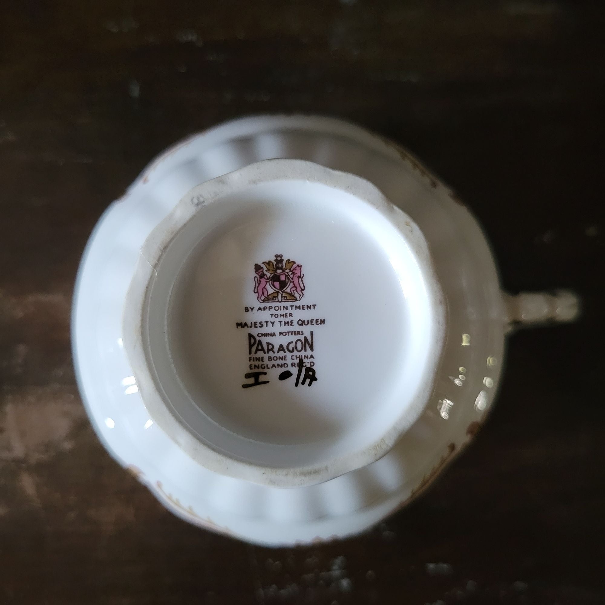 Vtg Paragon By Appointment To Her Majesty Tea Cup & Saucer Black Gold & Floral